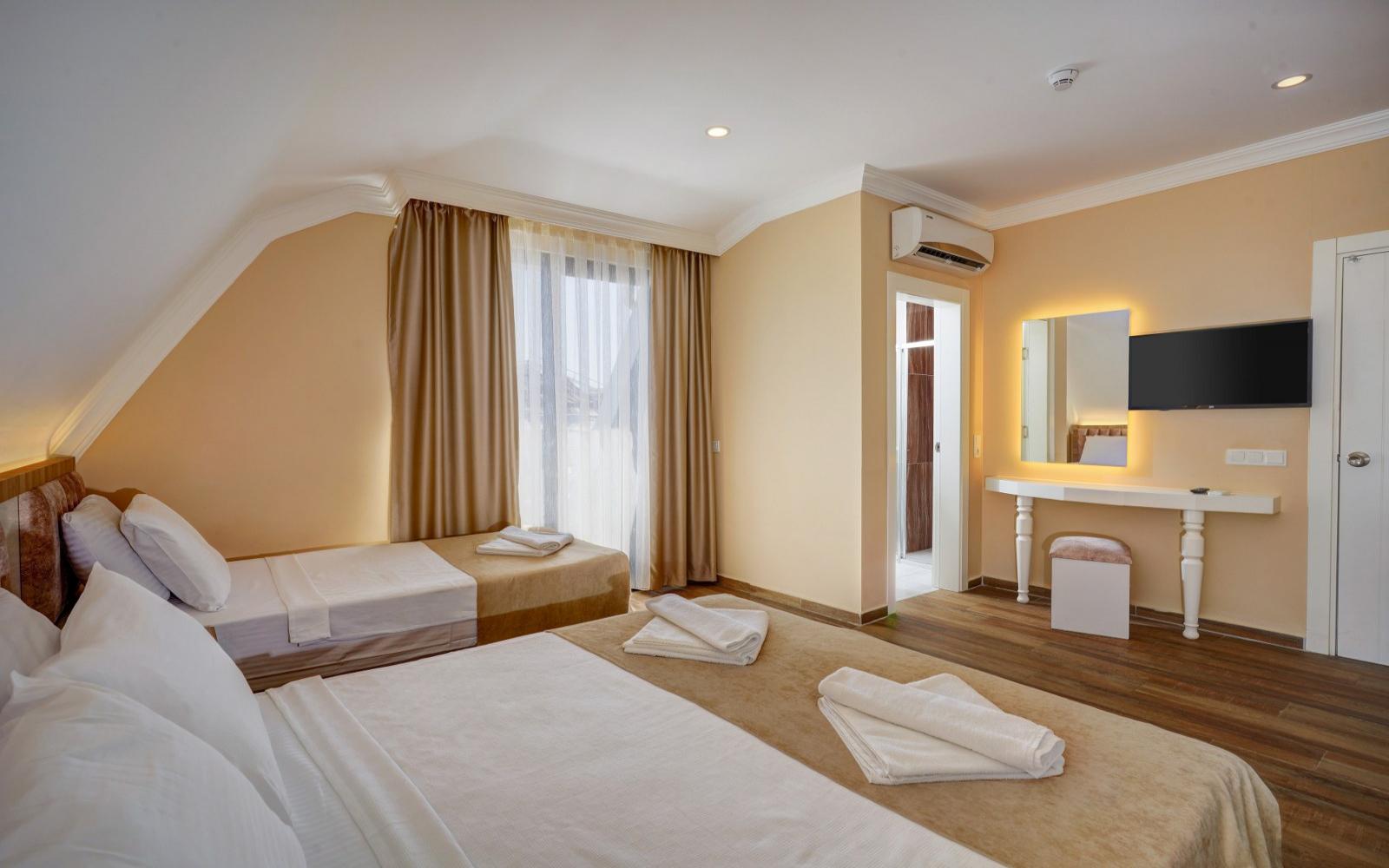 Özcan Otel Odalar